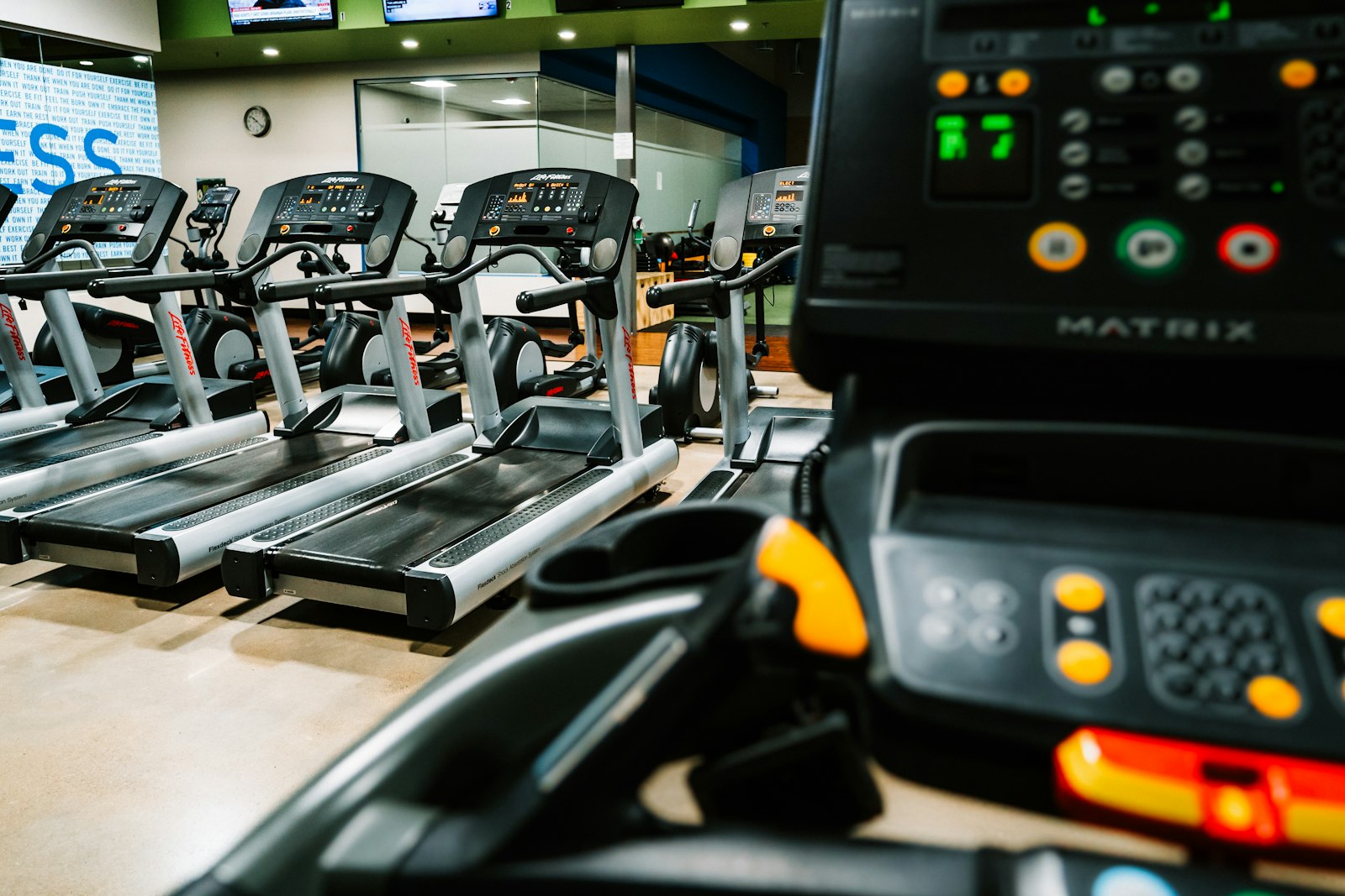 A row of treadmills, motion without forward progress